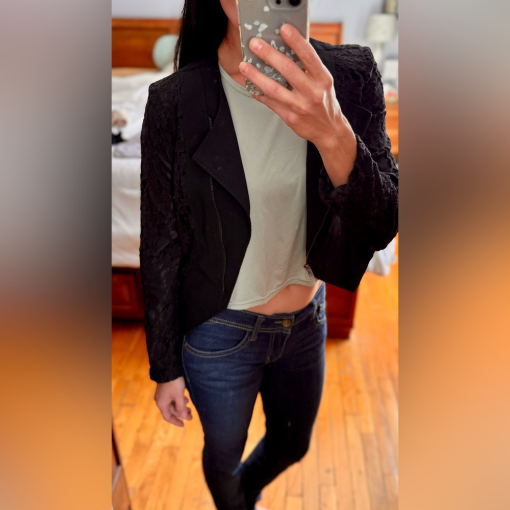 Black jacket with lace accent.